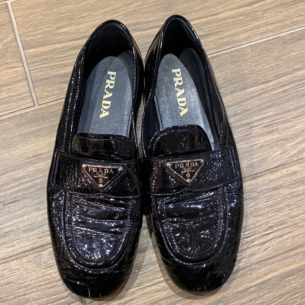 Women’s Prada patent leather loafers with logo